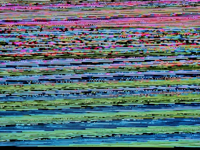 Stack on an old TV. Photo by Michael Dziedzic on Unsplash.