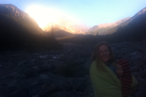Mother and child at the foot of Mt Rainier at sunrise. 